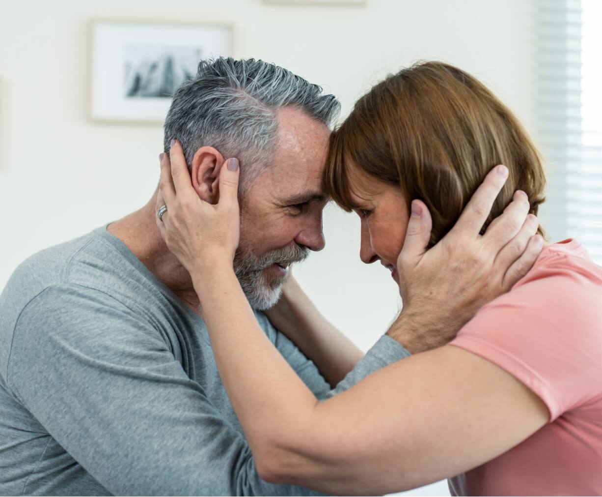 caucasian-senior-older-couple-sitting-on-bed-then-2025-04-01-21-18-14-utc-1