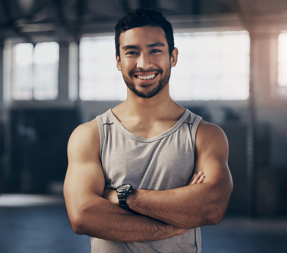 portrait-of-a-muscular-young-man-standing-with-his-2025-04-06-11-24-36-utc (2) (1)